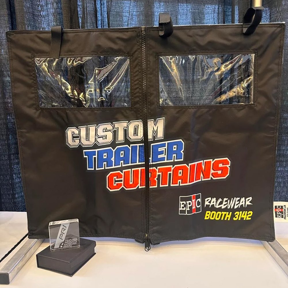 Custom printed racing trailer curtains with team graphics and sponsor logos